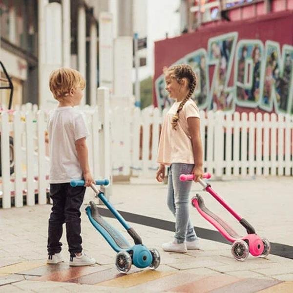 GLOBBER PRIMO FOLDABLE SCOOTER - NEON PINK